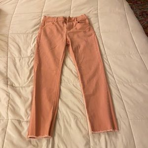 Light pink straight legged skinny jeans